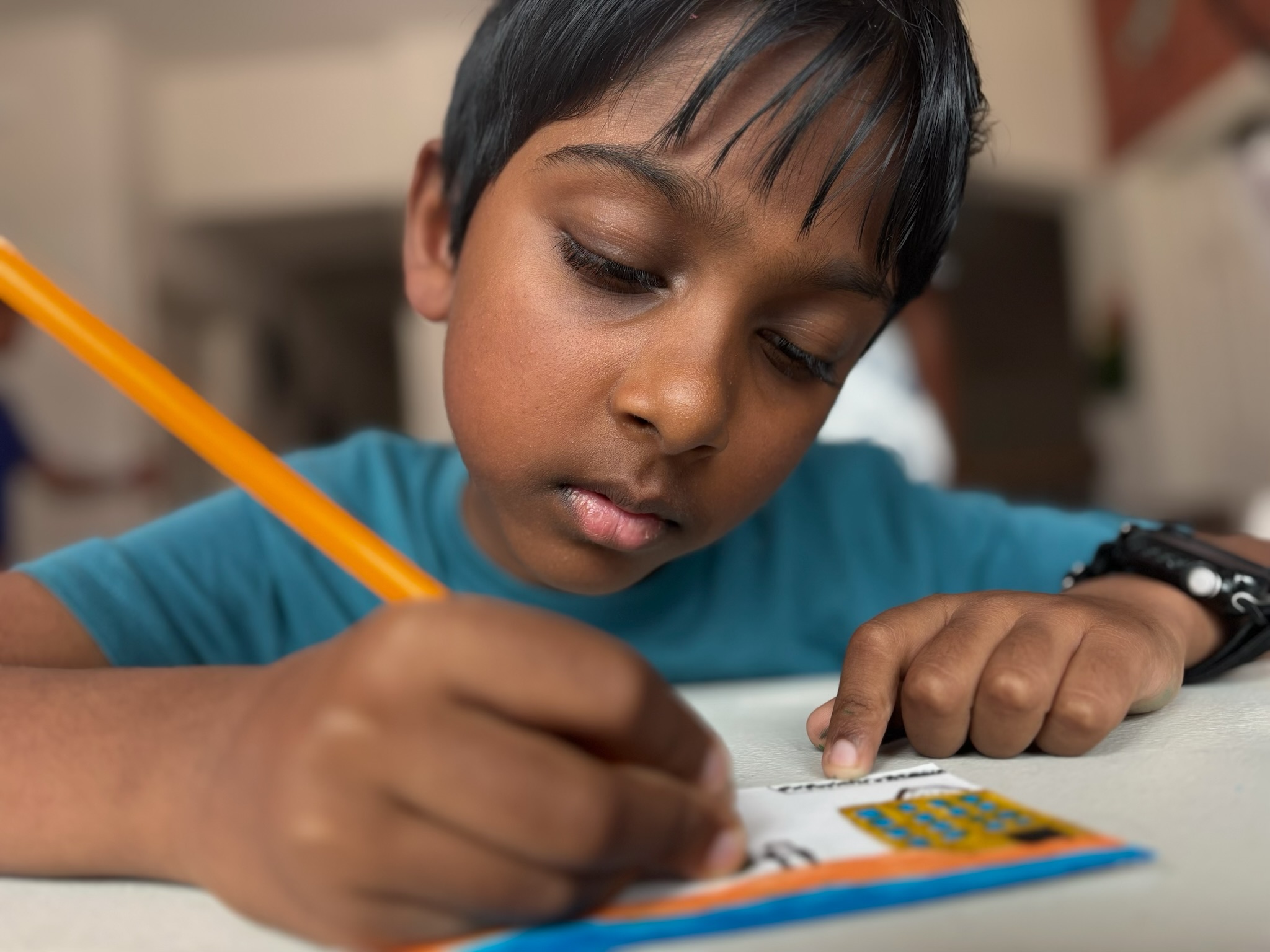 A student focused on a CTC workshop activity