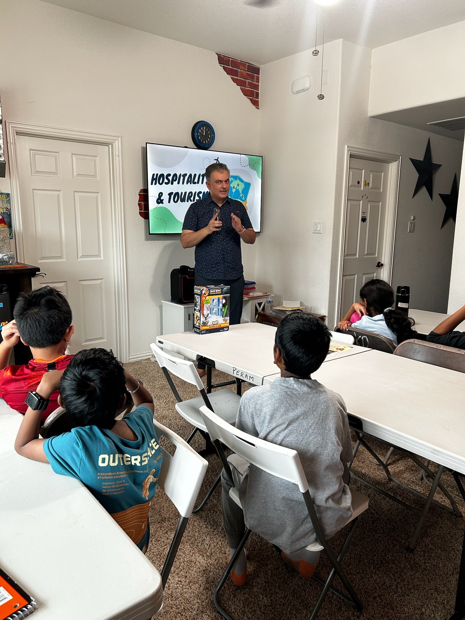 Vishal Singh teaching students about hospitality and tourism