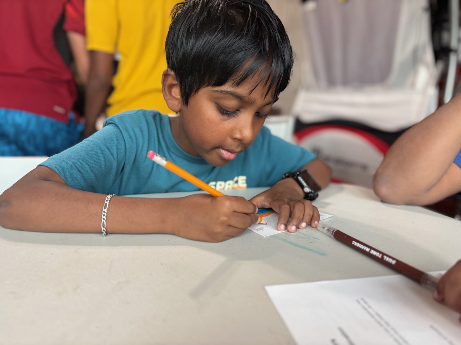 Student completing a workshop activity